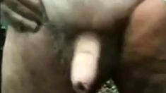 Old man wanking his uncut cock outside