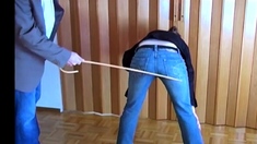 Hard caning because wearing wrong clothes