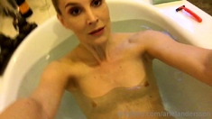 Busty amateur milf masturbates in the shower