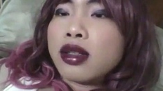 Asian Crossdresser Wanks in Bed