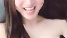 Amateur asian Lily masturbates her sexy body