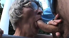 Sex-starved granny gets into a threesome with a couple of pricks